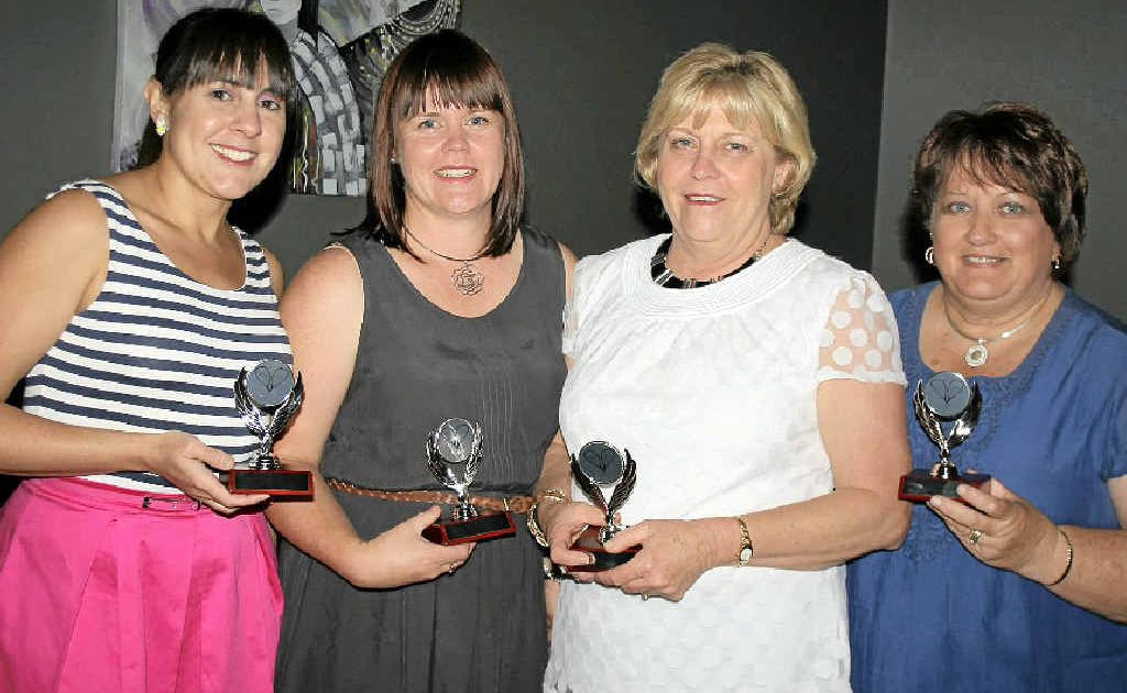 Line winners Silvana Malone, Jill Hume, Judy Collins and Jenny Gillott accept their trophies at the ladies squash presentation dinner. Line winners Silvana Malone, Jill Hume, Judy Collins and Jenny Gillott accept their trophies at the ladies squash presentation dinner.